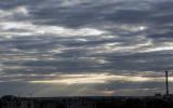 Sunlight filtering through the dense layer of clouds
Translated by «Yandex.Translator»