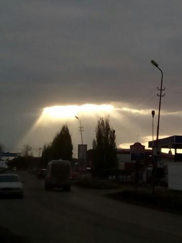 Sun rays through the clouds
Translated by «Yandex.Translator»
